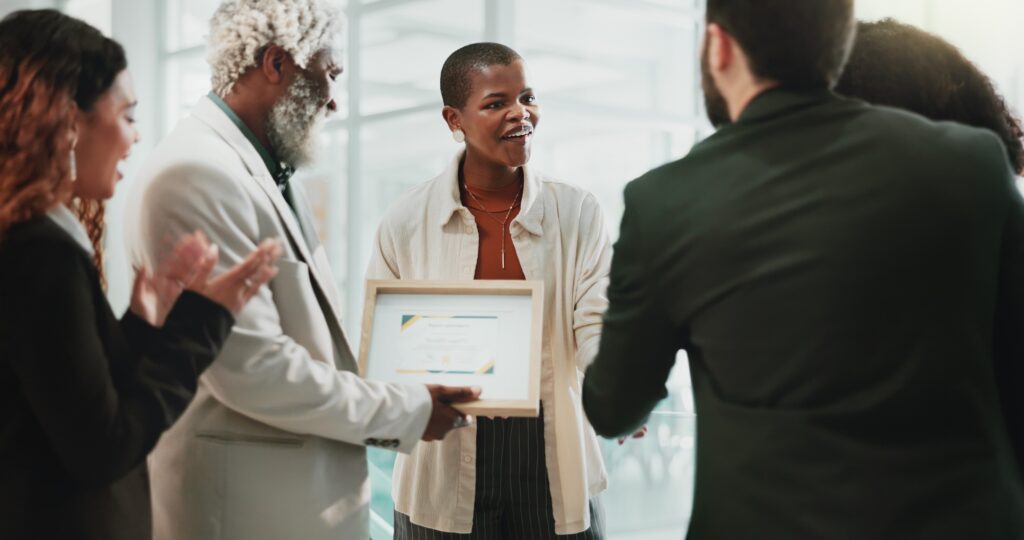 Business people, applause and celebration in office for certificate, achievement and development. T